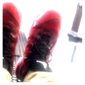 Red colored Jordans size 13